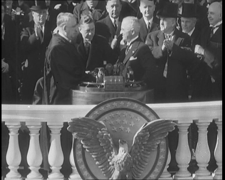 Harry Truman takes the oath. Click the still to view the film.